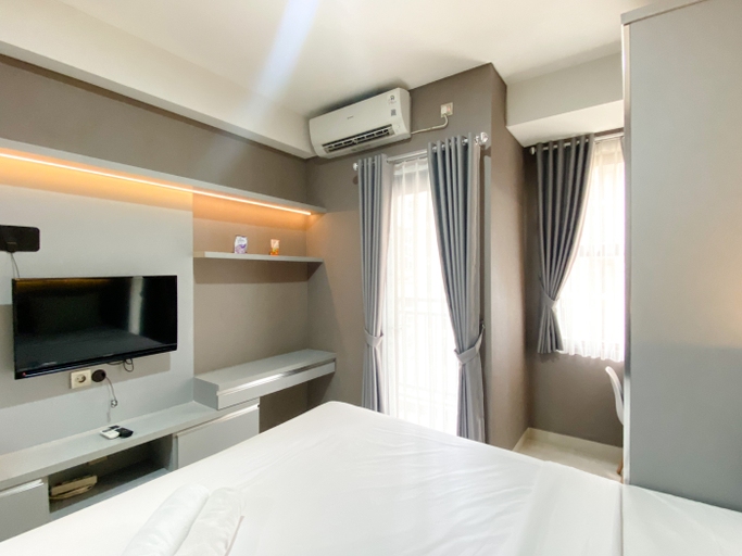 Bedroom 4, Modern Look Studio at Transpark Cibubur Apartment By Travelio, Depok