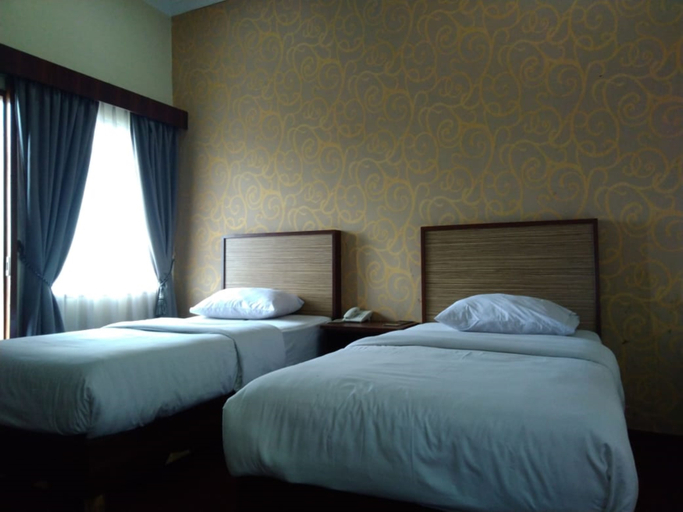 Bedroom 2, Hotel Grand Nusantara By Zuzu, Medan