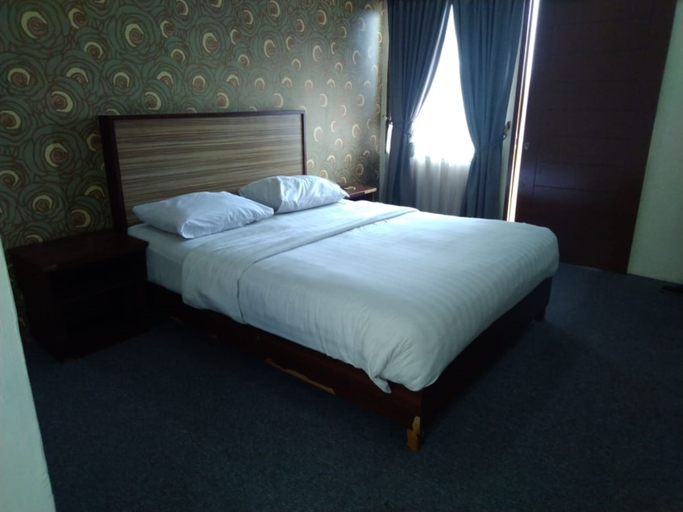 Bedroom 4, Hotel Grand Nusantara By Zuzu, Medan