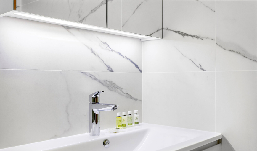 Bathroom, WelHome - Lovely Studio Apartment in Production City, Dubai