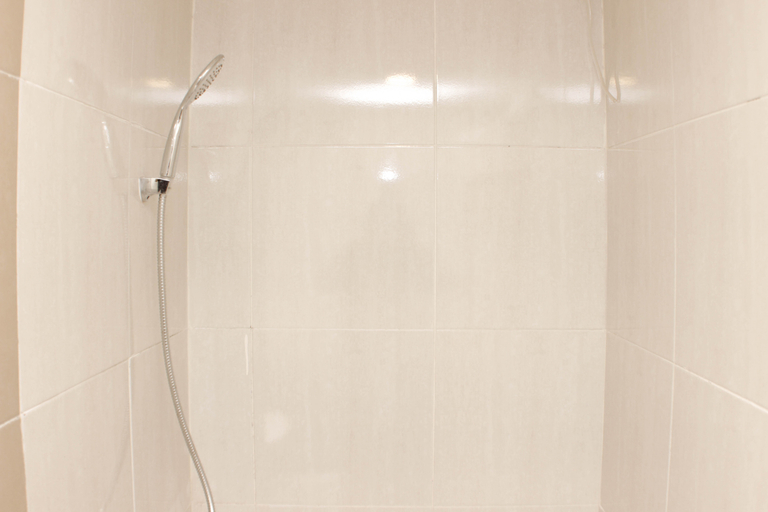Bathroom 5, Minimalist and Cozy 3BR at Meikarta Apartment By Travelio, Cikarang
