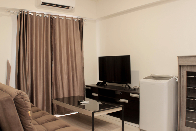 Minimalist and Cozy 3BR at Meikarta Apartment By Travelio, Cikarang