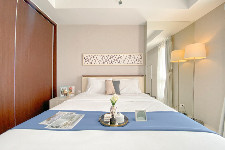 Bedroom 1, Spacious and Cozy Living Studio at Azalea Suites Apartment By Travelio, Cikarang