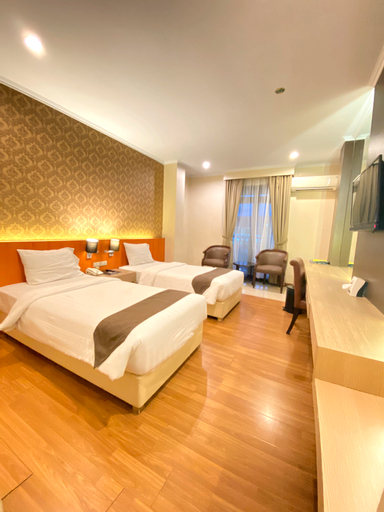 The Amrani Syariah Hotel - Tap to explore photos