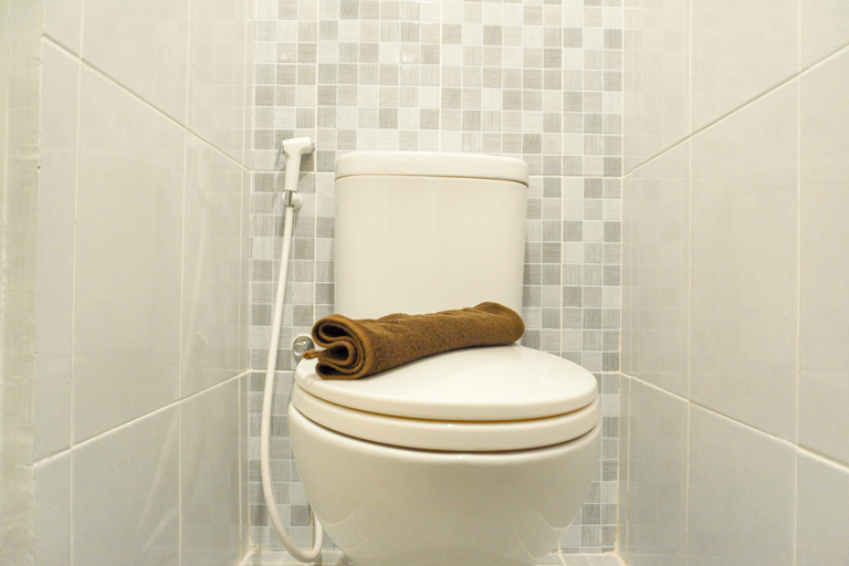 Bathroom 5, Comfy and Homey Studio at Tokyo Riverside PIK 2 Apartment By Travelio, Tangerang