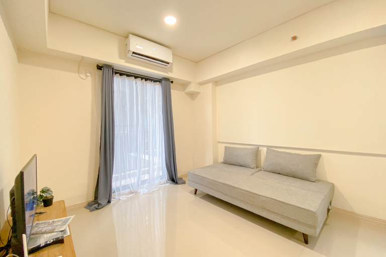 Bedroom 2, Relaxing and Cozy 2BR at Meikarta Apartment By Travelio, Cikarang