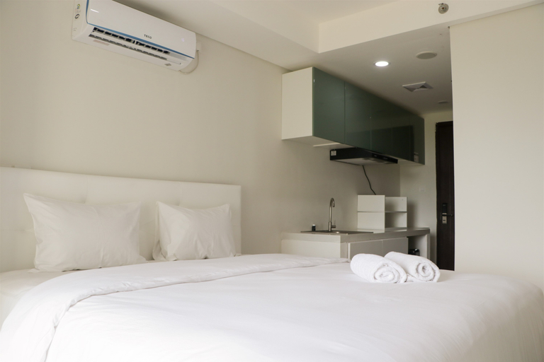 Bedroom 4, Elegant and Comfy Studio at Daan Mogot City Apartment By Travelio, West Jakarta