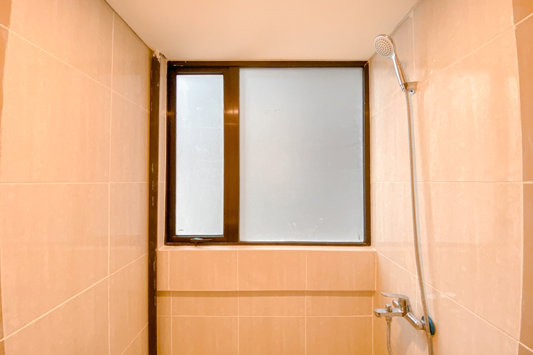 Bedroom 2, Homey and Comfort 2BR at Meikarta Apartment By Travelio, Cikarang