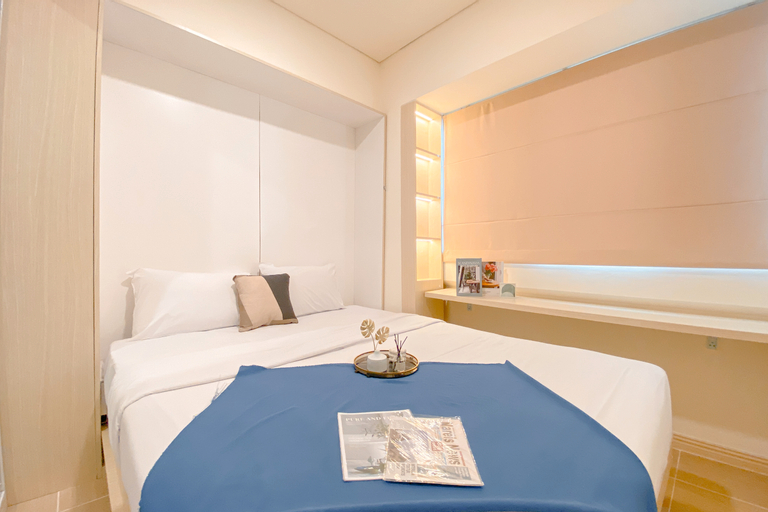 Bedroom 1, Cozy and Modern 2BR at Meikarta Apartment By Travelio, Cikarang