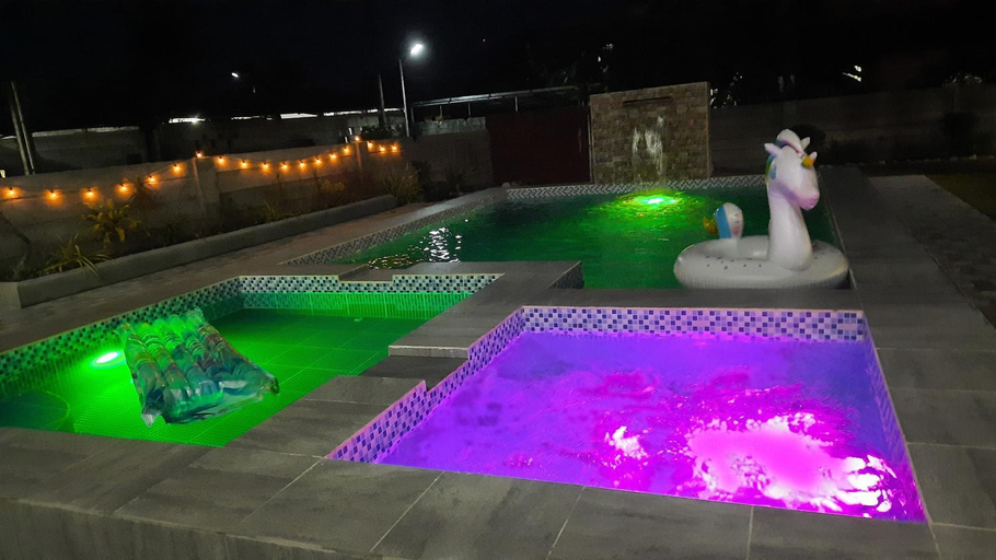 Others 3, LS Resthouse-Loft Studio w/ kitchen & pool access, Calapan City