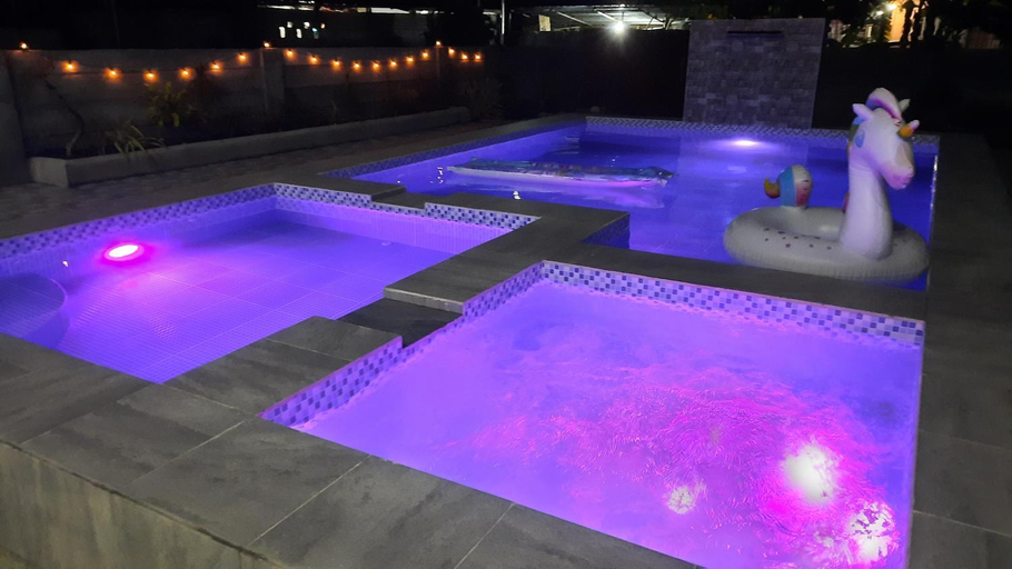 Others 4, LS Resthouse-Loft Studio w/ kitchen & pool access, Calapan City