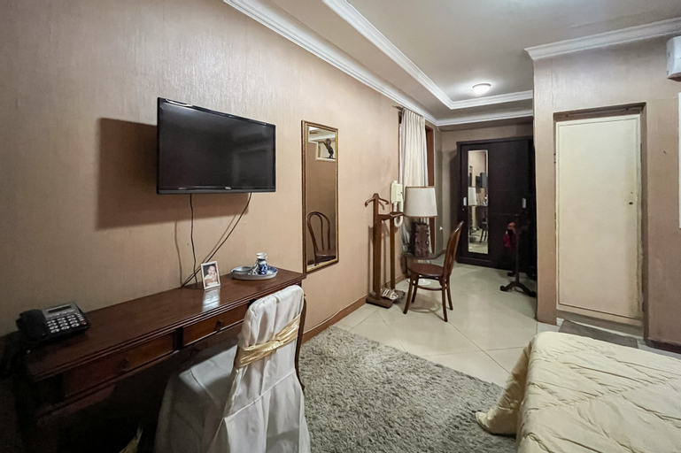 Urbanview de Dharmawangsa Suite Hotel - Tap to explore photos