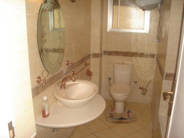 Bathroom 3, 3 Bed Rooms Ac Fully Equipped flat in Mohandsseen Cairo, Al-'Ajuzah