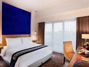 Swiss-Belinn Malang Room Type - Deluxe Queen Bed