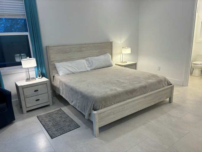 Bedroom 2, Twin Coves Tranquility: Private Beachfront Estate