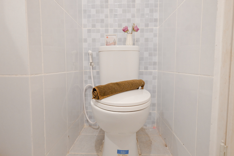 Bathroom 5, Good Deal Compact Studio at Tokyo Riverside PIK 2 Apartment By Travelio, Tangerang