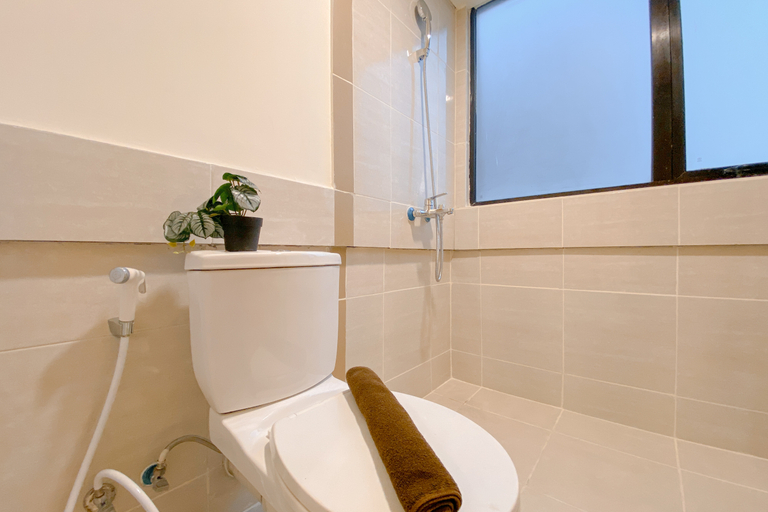 Bathroom 5, Minimalist and Tranquil 2BR Meikarta Apartment By Travelio, Cikarang