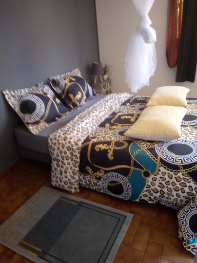 Others 3, La Chambre bleue, Komo-Mondah