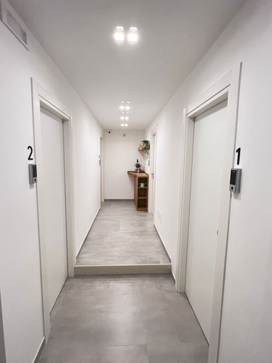 Others 5, Le camere del centro, Matera