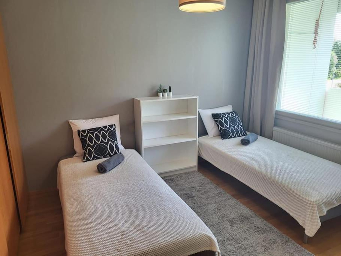 Bedroom 5, Liberty apartments Inkilanmaki 23 with free parking, North Savonia