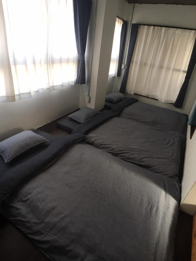 Bedroom 2, Golden Mile Apartment, Amami