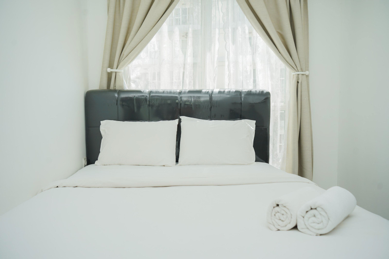 Fancy and Cozy 1BR at Casa de Parco Apartment By Travelio