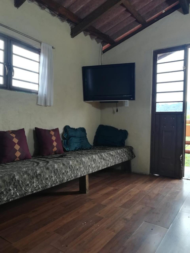 Shared lounge/TV area, Cabana El Salto, Nauzontla