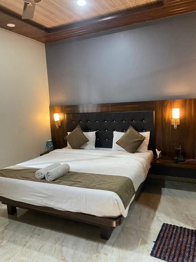 Bedroom 3, Hotel Om Palace, Satara