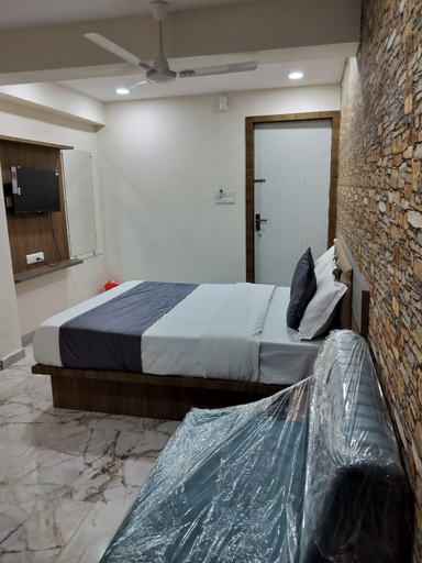 Bedroom 5, Goroomgo NR Nayan Residency Ahmedabad, Ahmadabad