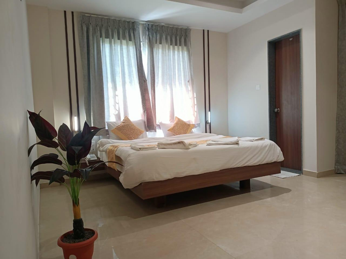 Bedroom 2, Hotel Om Residncy Miraj, Sangli
