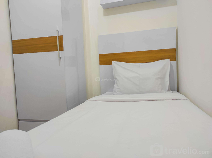 Bedroom 2, Homey and Comfy 2BR at Vida View Apt By Travelio, Makassar