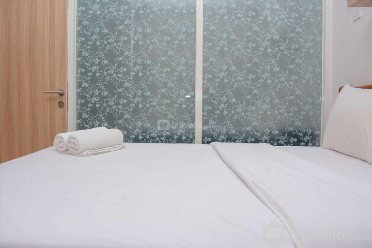 Bedroom 2, Homey 1BR at Atlanta Residences Apt By Travelio, Depok
