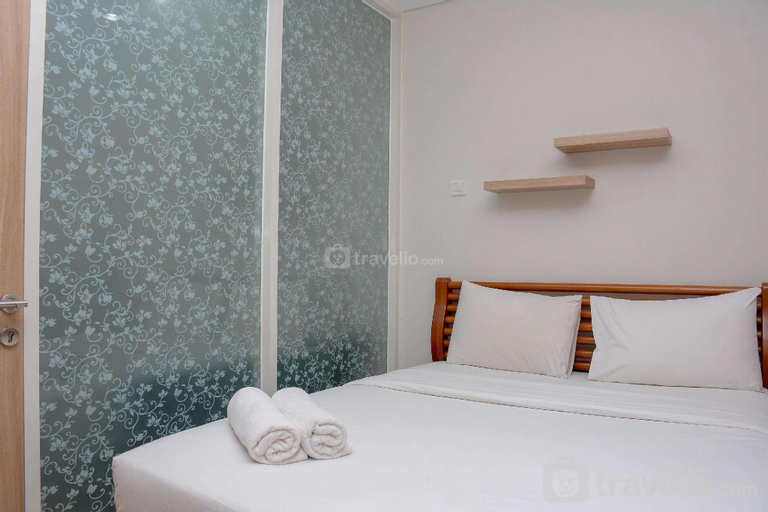 Bedroom 1, Homey 1BR at Atlanta Residences Apt By Travelio, Depok