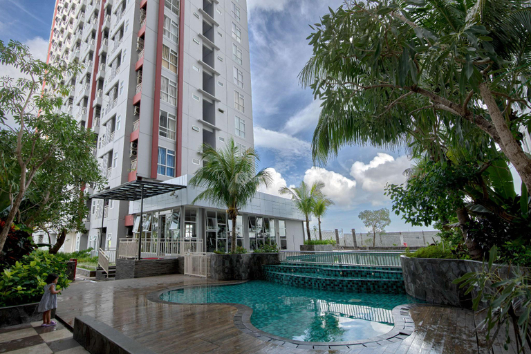Compact 2BR at Apt Vida View Makassar by Travelio, Makassar