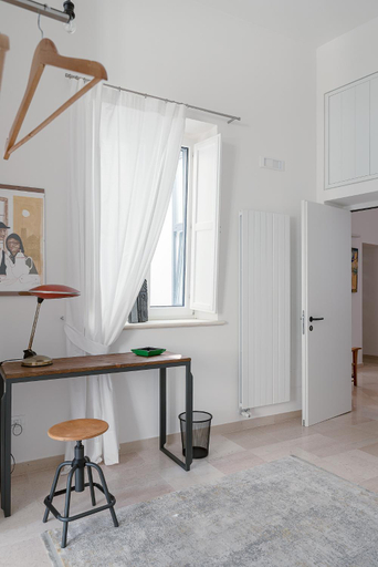 Others 5, Palazzo Charlie, Lecce