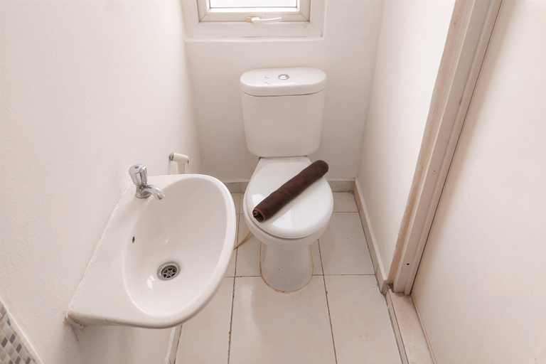 Bathroom 3, Minimalist and Homey Studio (No Kitchen) Apartment Aeropolis Residence By Travelio, Tangerang