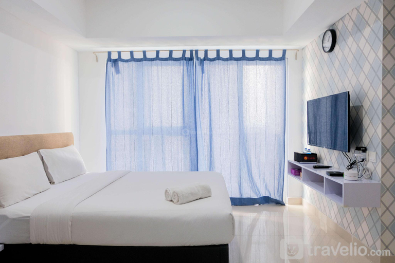 Bedroom 3, Elegant Studio Apt at Casa De Parco By Travelio, Tangerang