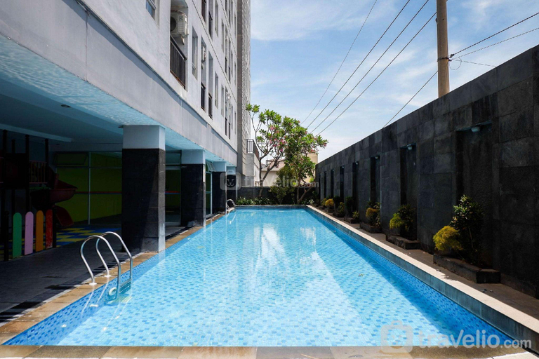 Others 3, Exquisite 1BR Apartment at Puri Mas By Travelio, Surabaya