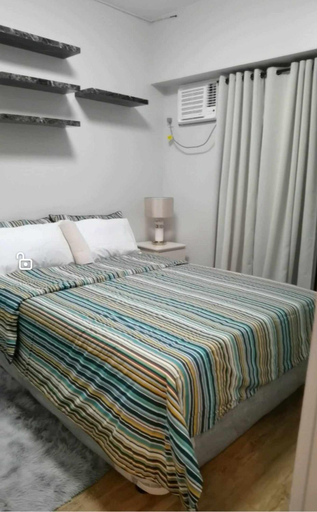 Bedroom 2, Modern 2BR Condo with Fiber Net and Netflix, Davao City