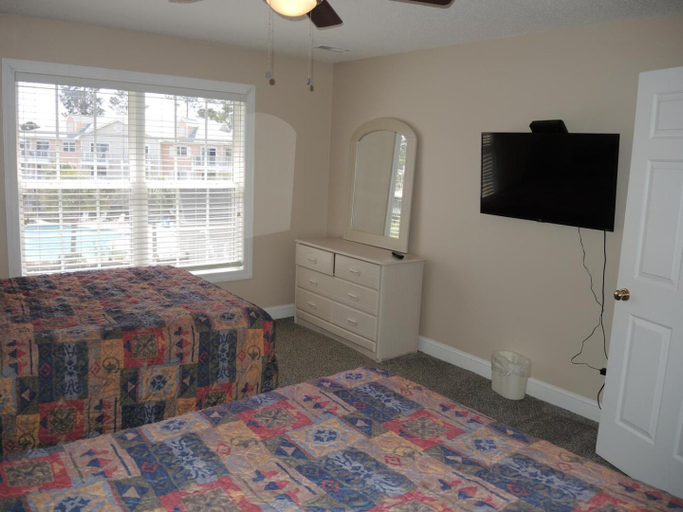 Bedroom 2, Pool View Unit 1509 at Brunswick Plantation feature 27 hole Golf Course Onsite, Brunswick