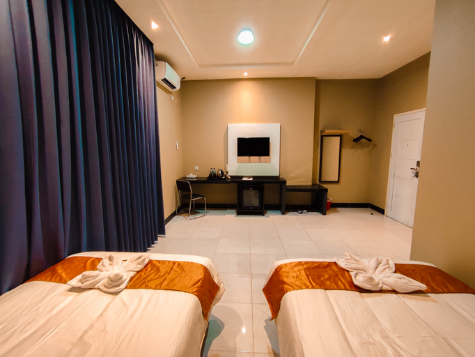 Vitta Hotel Manokwari Room Type - Deluxe Twin Bed Smoking