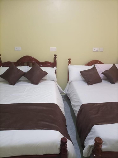 Bedroom 2, Legend Executive Suites, Burahya