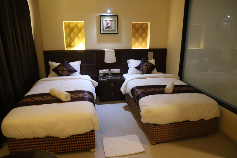 Bedroom 3, The Citiotel, Pune