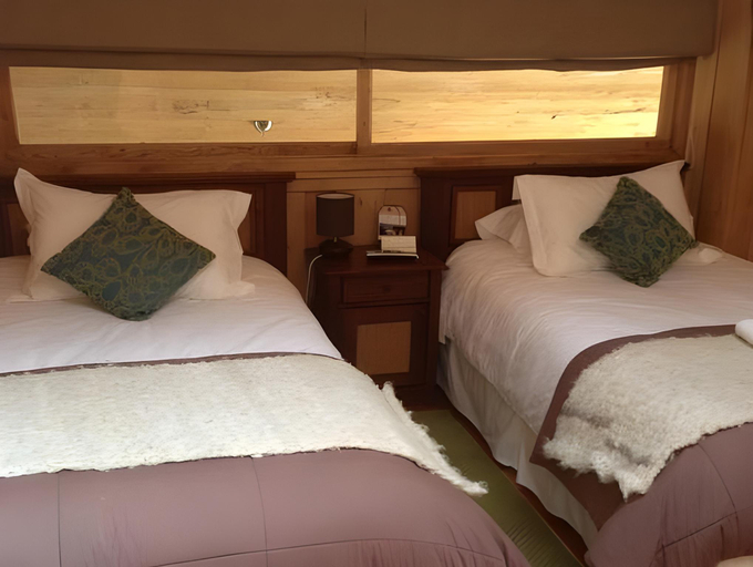 Bedroom 2, Alto Melimoyu Hotel & Patagonia, Aisén