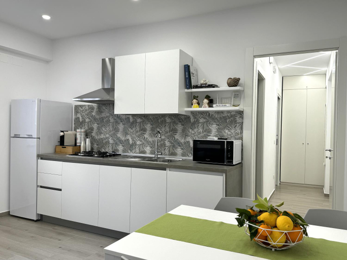 Others 4, Thetis Apartments, Messina