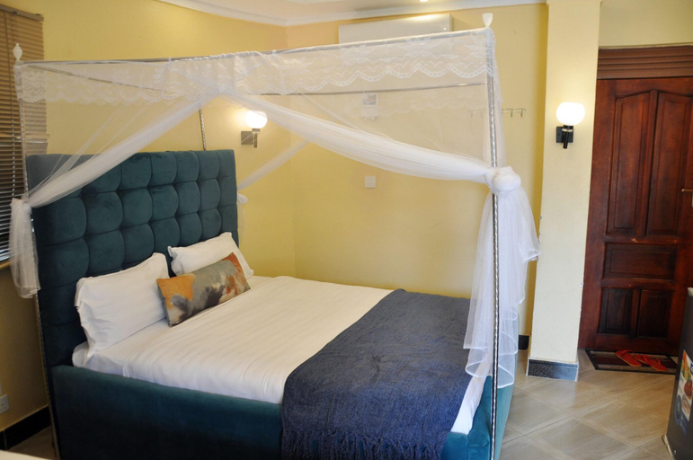 Bedroom 5, Global Village Resort, Jonam