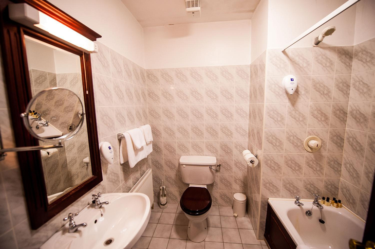 Bathroom 4, The Devon Inn Hotel