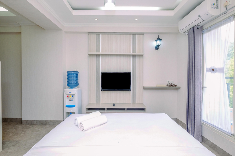 Bedroom 2, Homey Studio Room at Podomoro Golf View Apartment By Travelio, Bogor