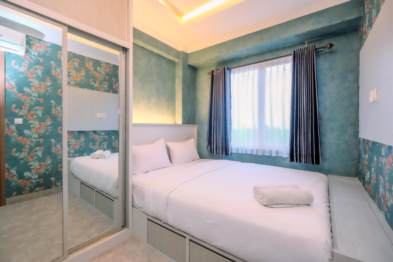 Warm and Comfortable Designed 2BR at Podomoro Golf View Apartment By Travelio, Bogor