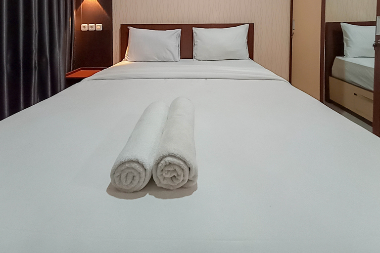 Brand New and Homey Studio at Tamansari Skylounge Makassar Apartment By Travelio, Makassar
